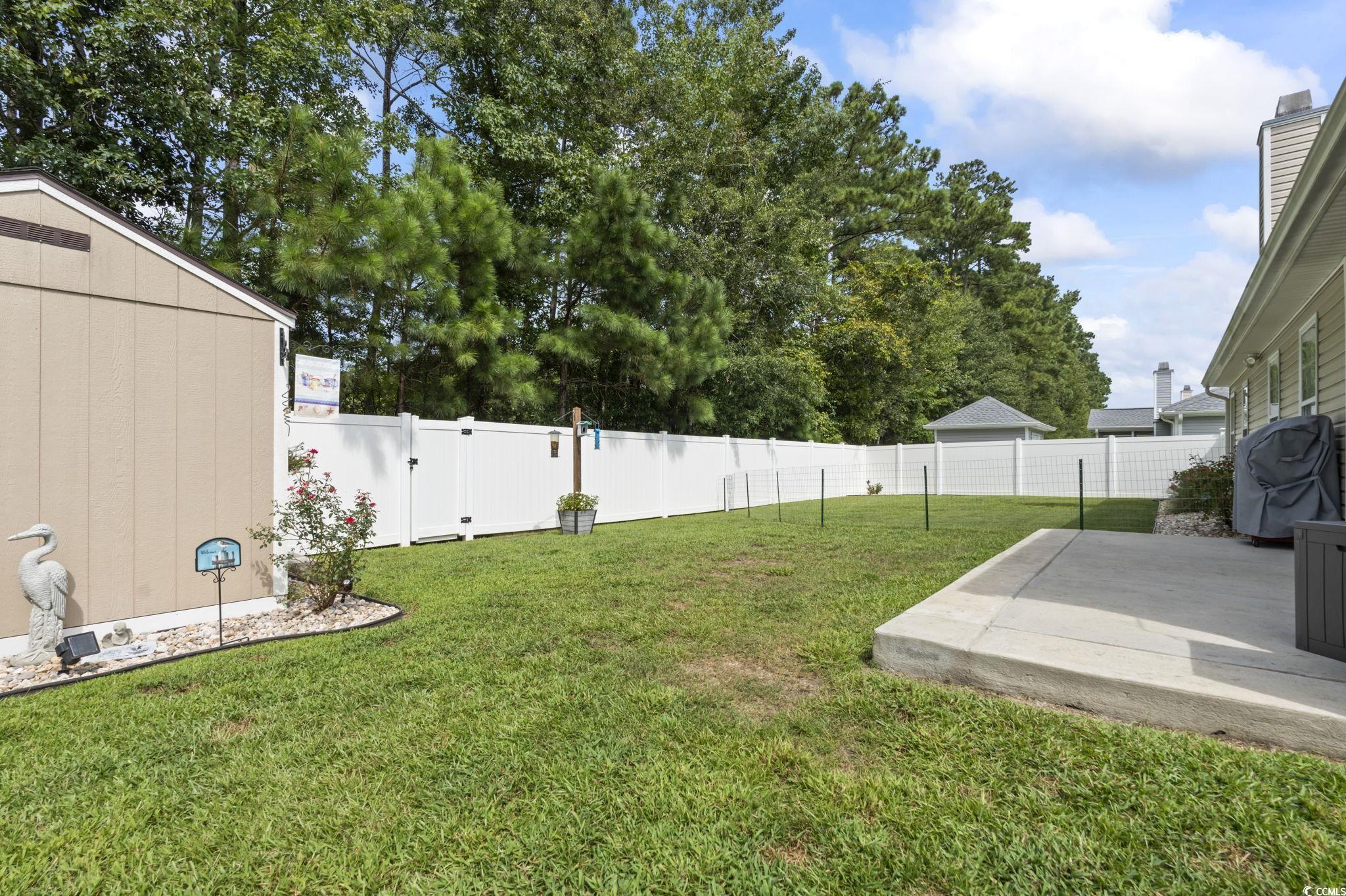1604 Langley Drive Longs, SC 29568 - Photo 34 of 37 Sunroom / solarium with outdoor lounge area and ceiling fan
