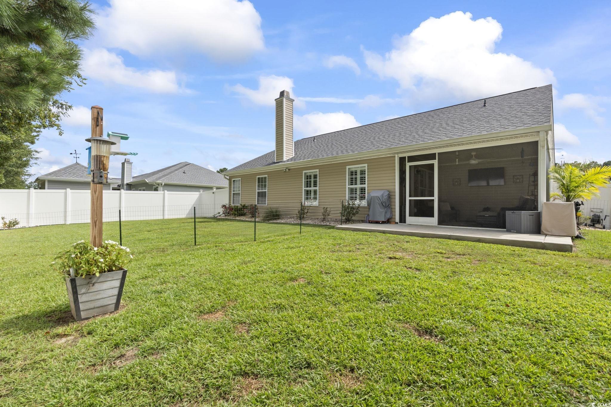 1604 Langley Drive Longs, SC 29568 - Photo 35 of 37 Fenced backyard featuring a patio area