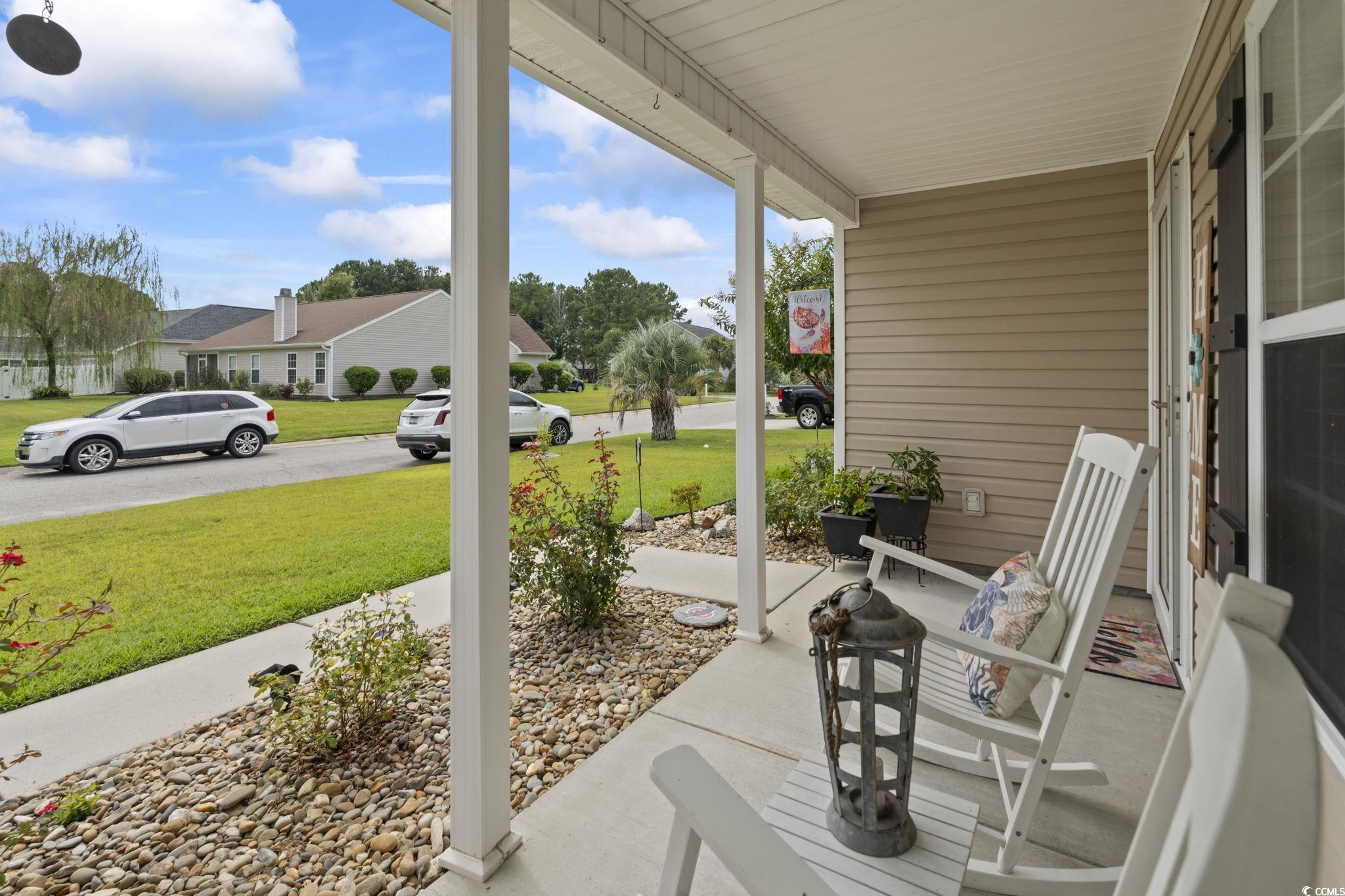 1604 Langley Drive Longs, SC 29568 - Photo 8 of 37 Porch featuring a yard