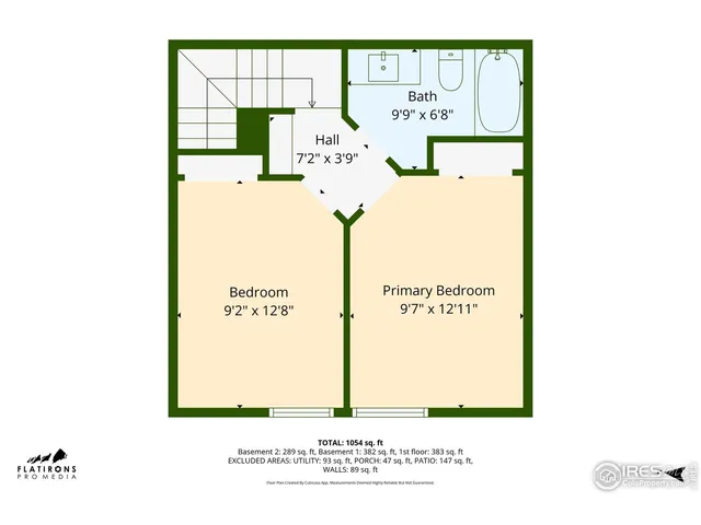 a picture of a bench in front of a wall