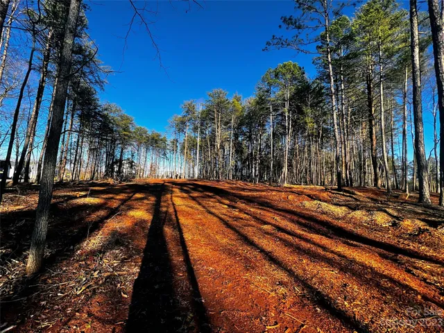 a view of swimming pool with an outdoor seating