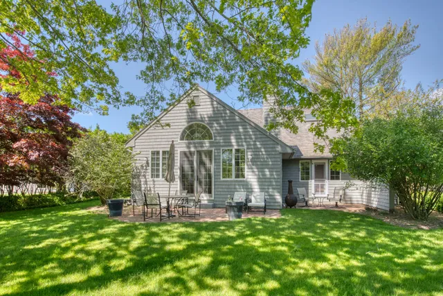 a front view of a house with yard