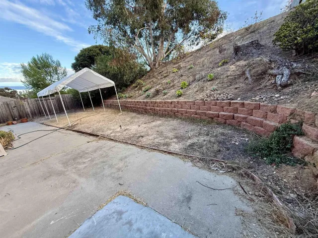 an empty room with a empty space and a window