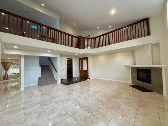 a bathroom with a tub and a window