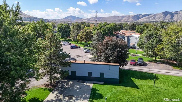an aerial view of a house with a garden