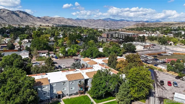 an aerial view of a house with outdoor space