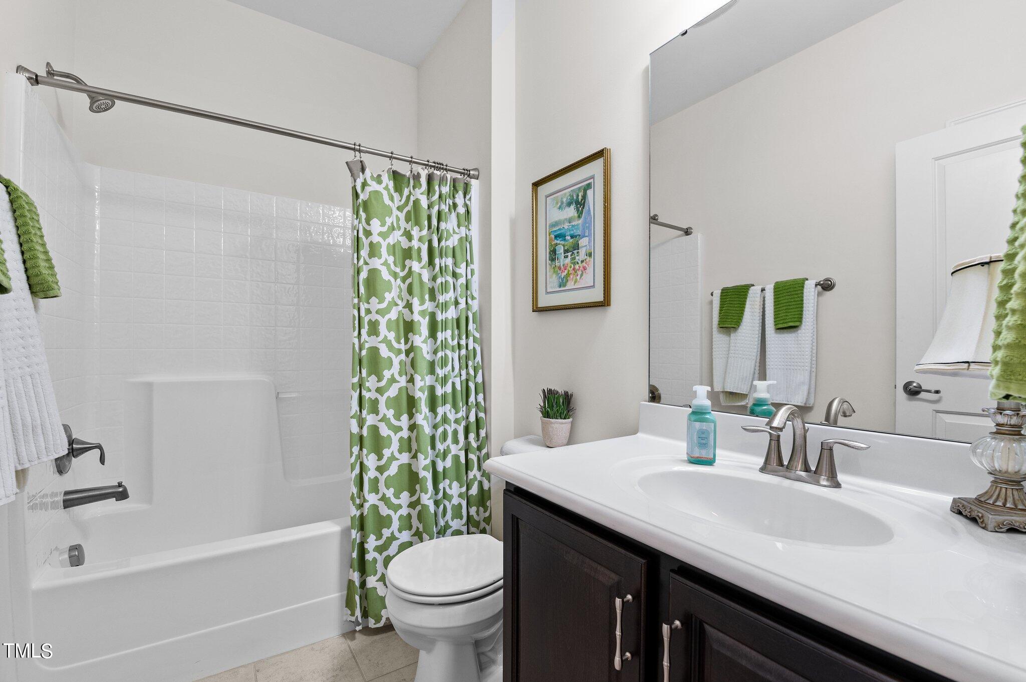 5657 Wade Park Boulevard Raleigh, NC 27607 - Photo 14 of 24 Hall Bathroom
