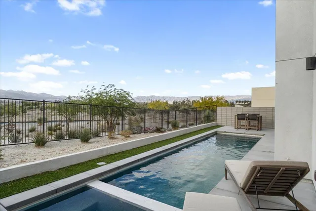 a view of swimming pool with a terrace