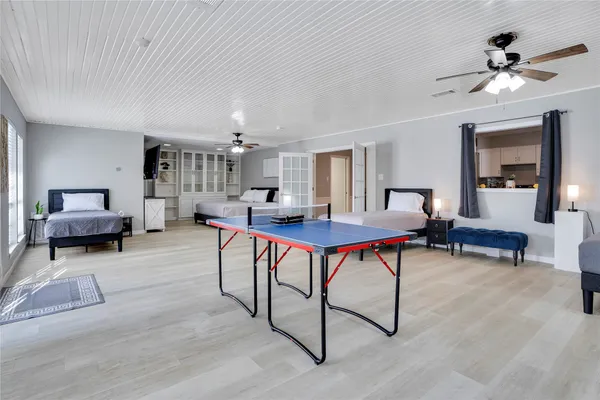 a living room with furniture and a rug