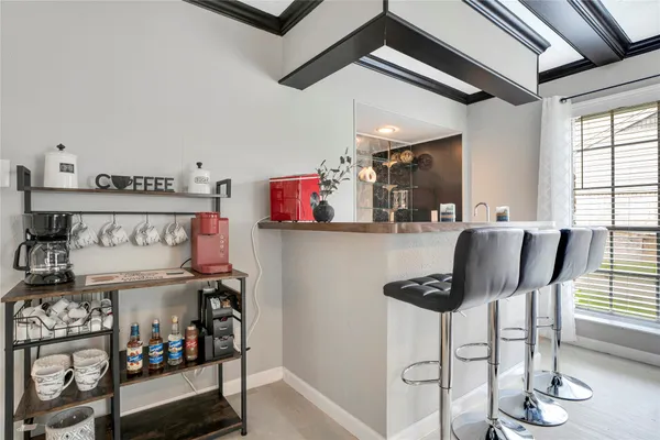 a kitchen with stainless steel appliances granite countertop a stove and a cabinets