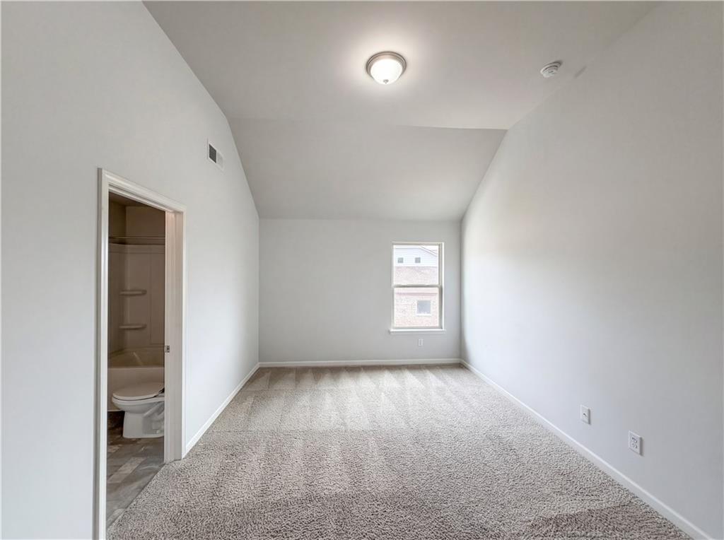 1549 Harlequin Way Stockbridge, GA 30281 - Photo 20 of 30 an empty room with windows