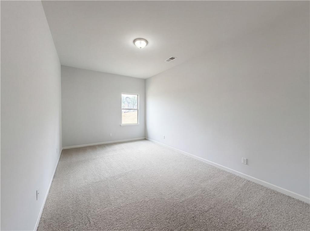 1549 Harlequin Way Stockbridge, GA 30281 - Photo 23 of 30 a view of empty room