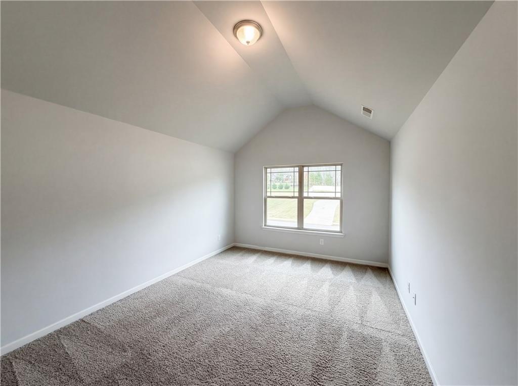 1549 Harlequin Way Stockbridge, GA 30281 - Photo 25 of 30 an empty room with a window