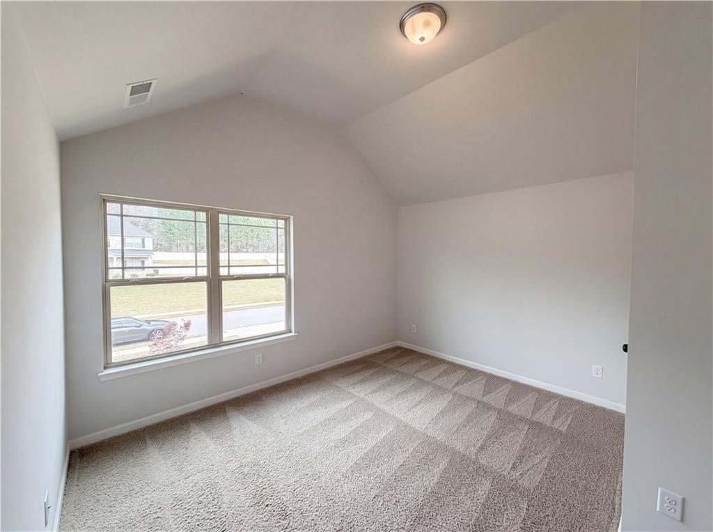 1549 Harlequin Way Stockbridge, GA 30281 - Photo 28 of 30 an empty room with a window