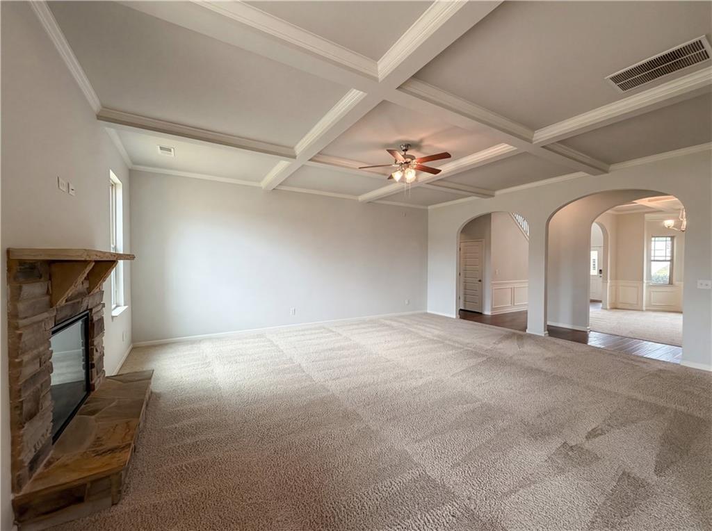 1549 Harlequin Way Stockbridge, GA 30281 - Photo 9 of 30 a view of empty room with a fireplace
