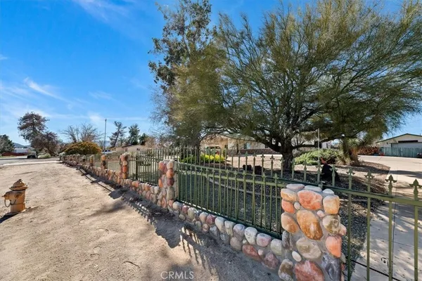 a balcony with trees in front of it