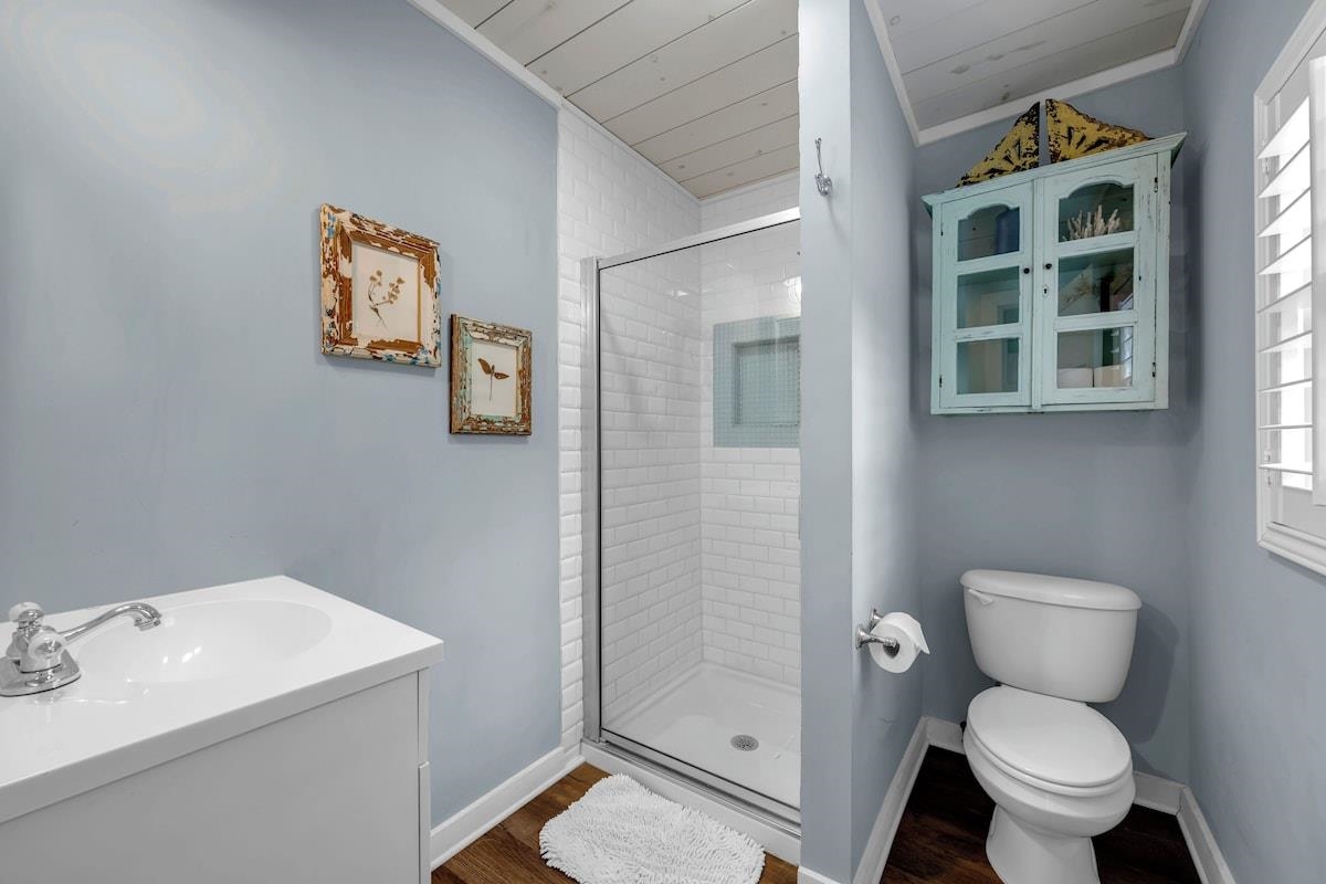 200 Highland Loop Kingsland, TX 78639 - Photo 15 of 23 a bathroom with a toilet sink and shower