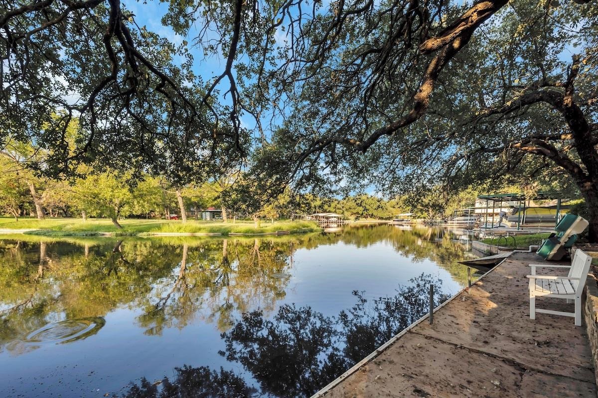 200 Highland Loop Kingsland, TX 78639 - Photo 22 of 23 a view of a lake with a mountain