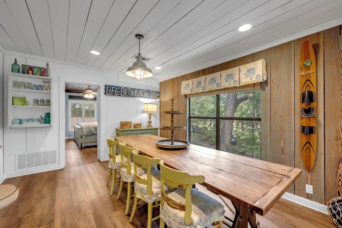 200 Highland Loop Kingsland, TX 78639 - Photo 6 of 23 a view of a dining room with furniture large window and wooden floor