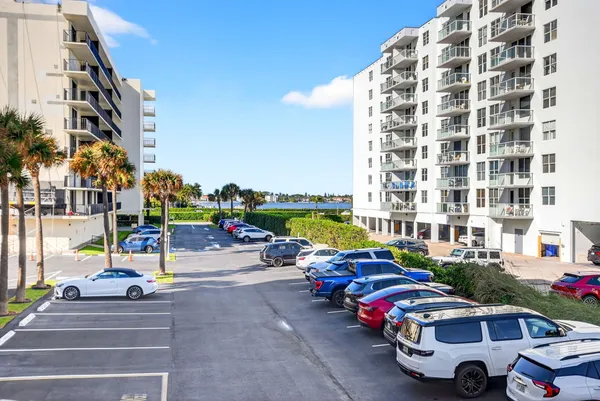 a view of a balcony with chairs