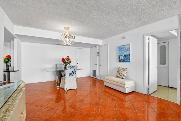 a very nice looking room with a table and chairs