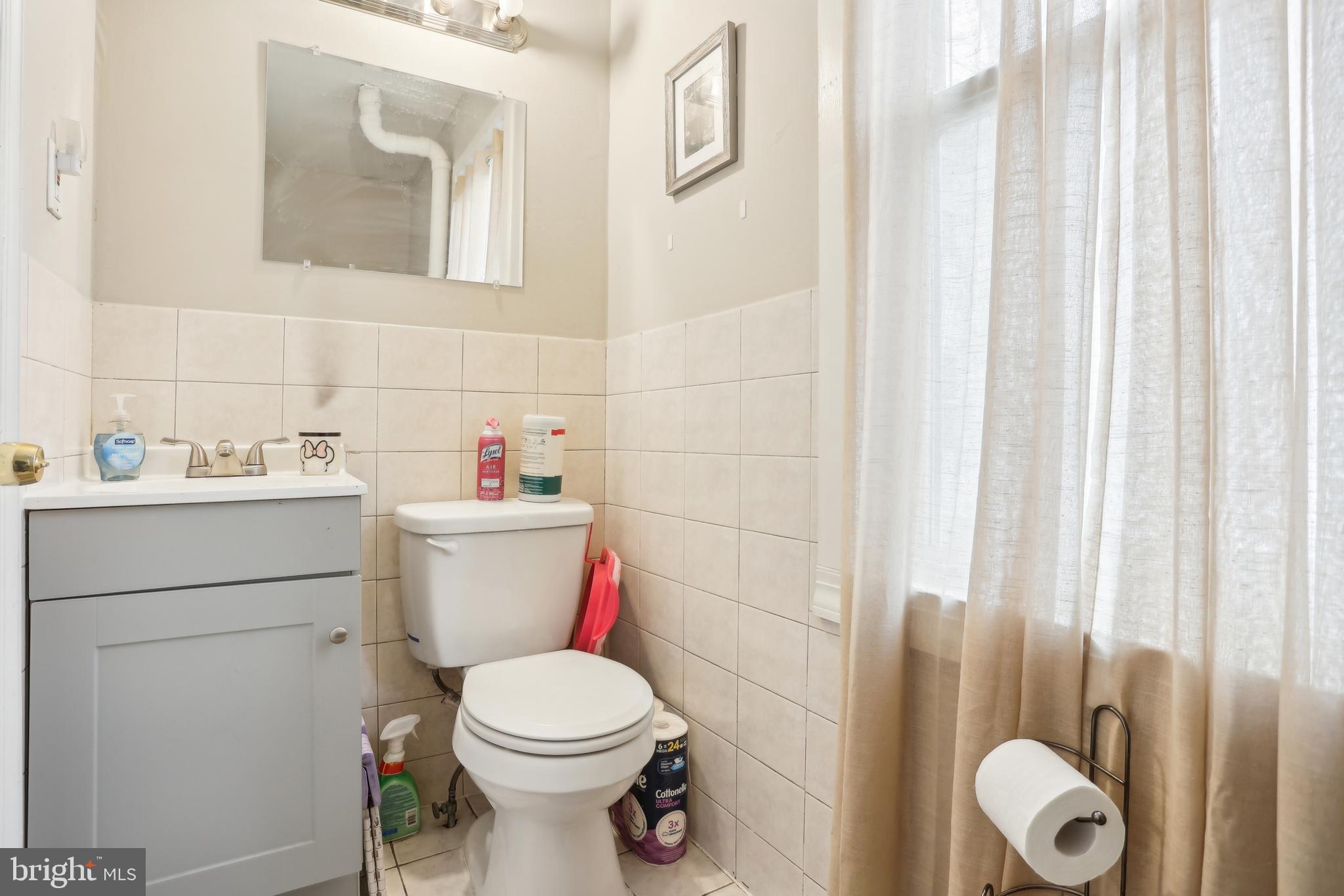 705 Burlington Avenue Delanco, NJ 08075 - Photo 16 of 41 a white toilet sitting next to a bathroom sink