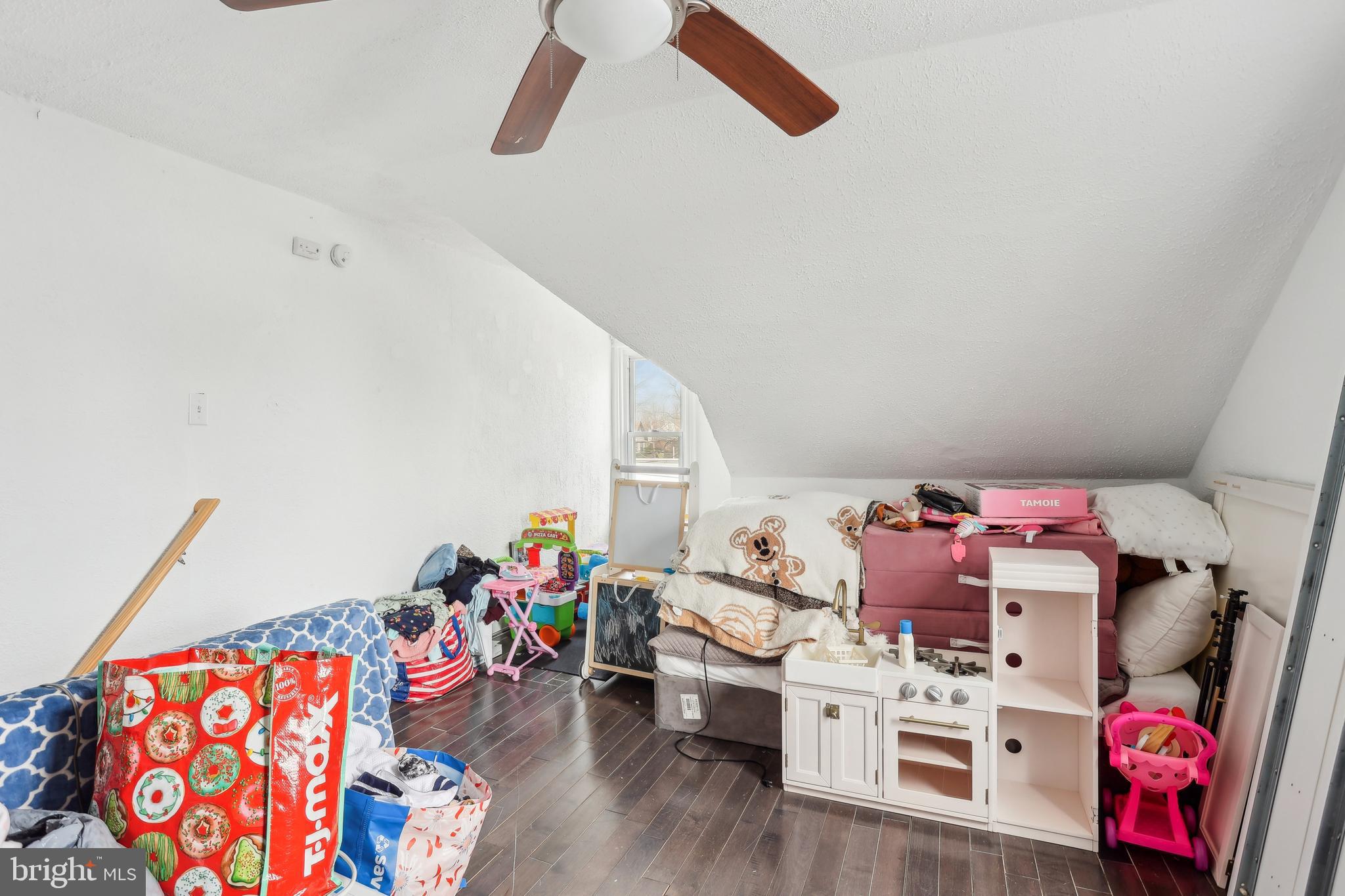 705 Burlington Avenue Delanco, NJ 08075 - Photo 27 of 41 a living room with furniture and a wooden floor