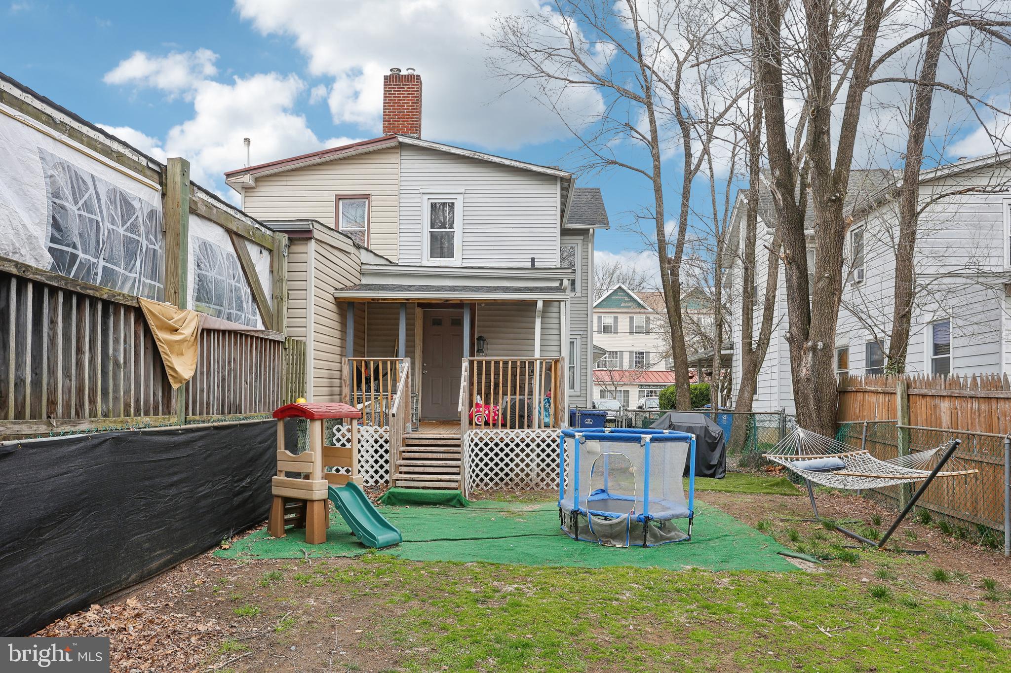 705 Burlington Avenue Delanco, NJ 08075 - Photo 35 of 41 a view of a chair and table in backyard of the house