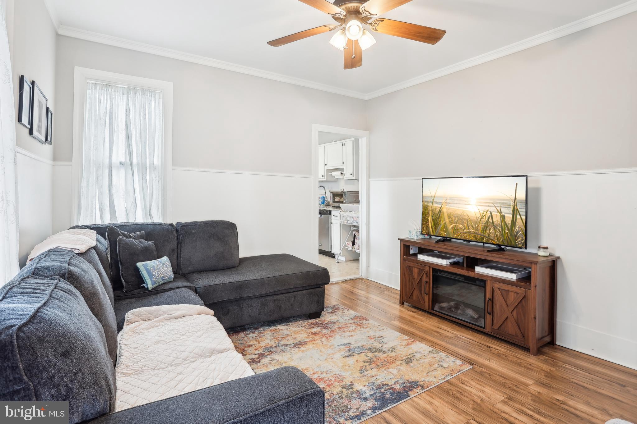 705 Burlington Avenue Delanco, NJ 08075 - Photo 6 of 41 a living room with furniture and a flat screen tv