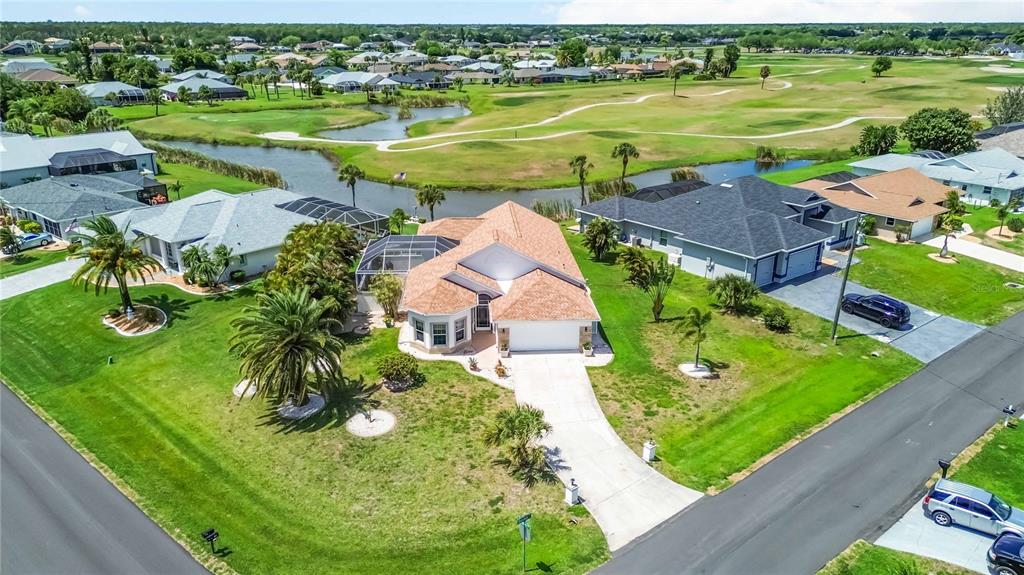 48 Bunker Road Rotonda West, FL 33947 - Photo 49 of 59 an aerial view of a house with a lake view
