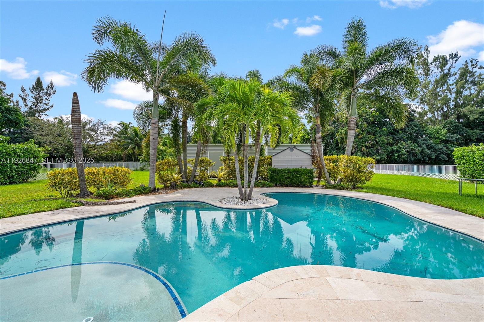 14330 Southwest 16th Street Davie, FL 33325 - Photo 41 of 53 a view of a swimming pool with a yard