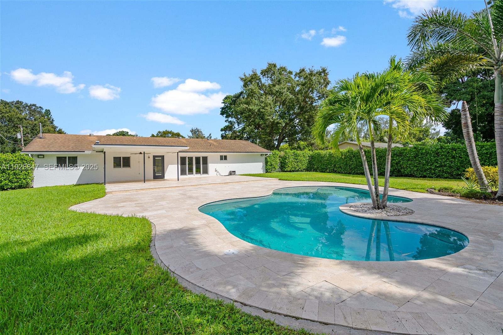 14330 Southwest 16th Street Davie, FL 33325 - Photo 44 of 53 a view of a house with a swimming pool