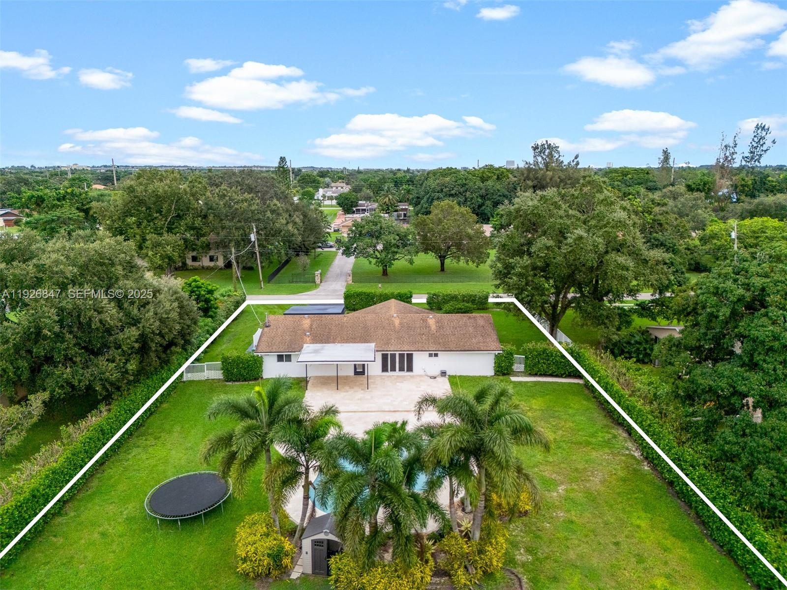 14330 Southwest 16th Street Davie, FL 33325 - Photo 47 of 53 a view of a tennis court