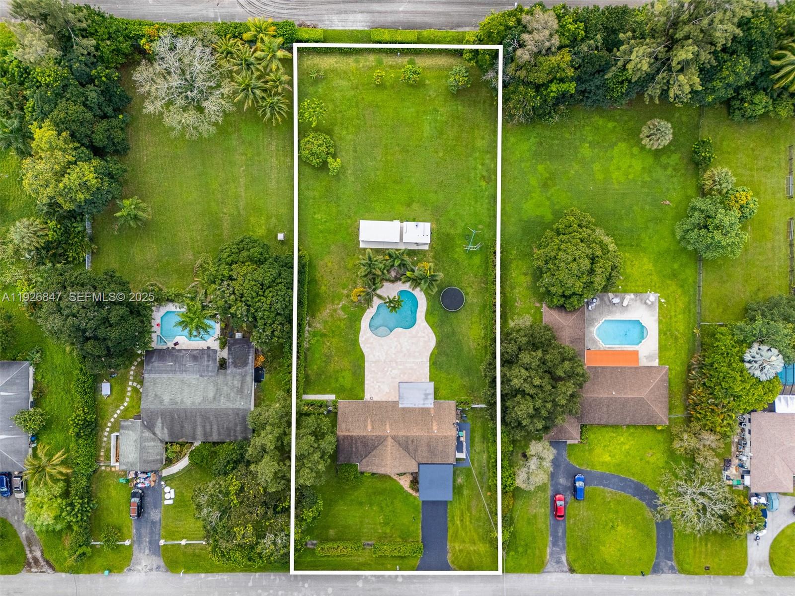 14330 Southwest 16th Street Davie, FL 33325 - Photo 48 of 53 an aerial view of a house with a yard pool outdoor seating and yard