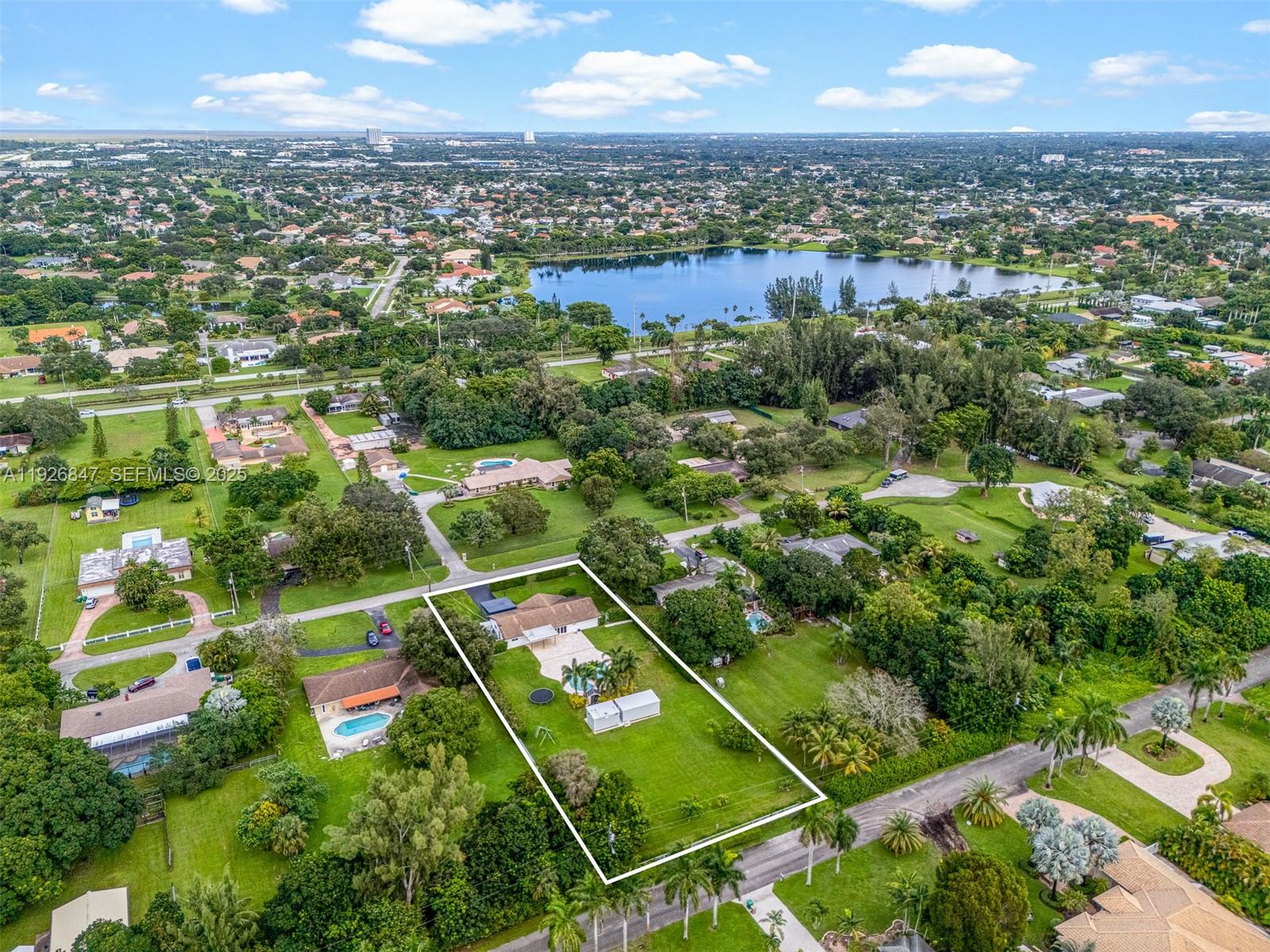 14330 Southwest 16th Street Davie, FL 33325 - Photo 50 of 53 an aerial view of residential houses with outdoor space and trees