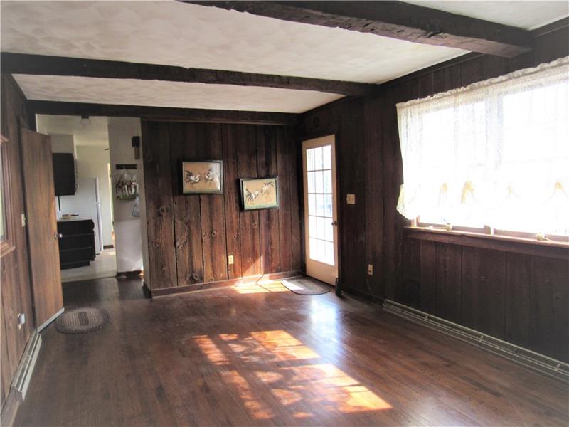 144 Headland Road Butler, PA 16002 - Photo 19 of 25 17x11 first floor family room exterior door goes to back deck