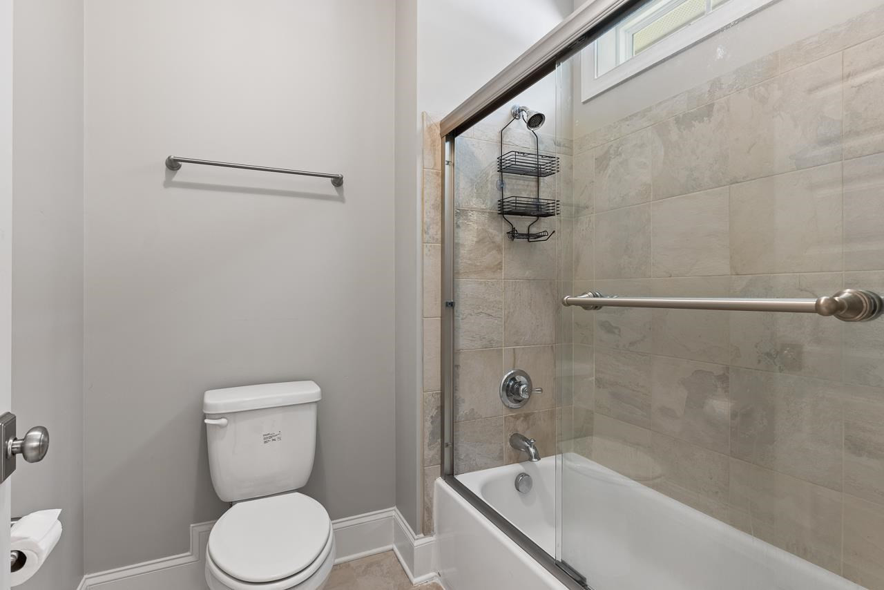 8429 Covington Ridge Road Wake Forest, NC 27587 - Photo 21 of 30 Secondary bath has a separate vanity area and water closet/shower. Secondary full bath