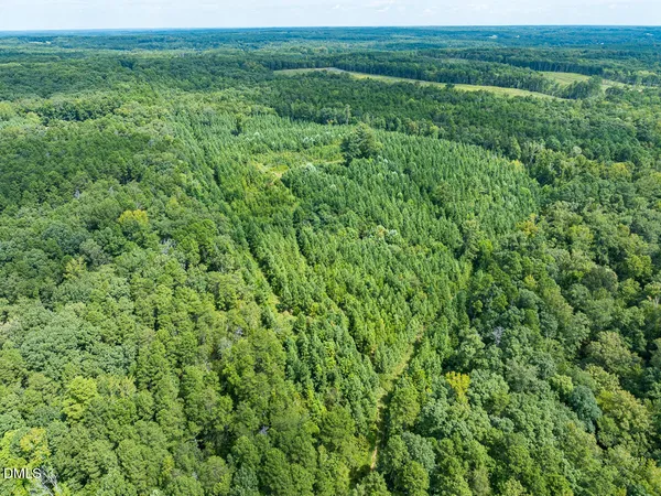 an aerial view of residential house with outdoor space