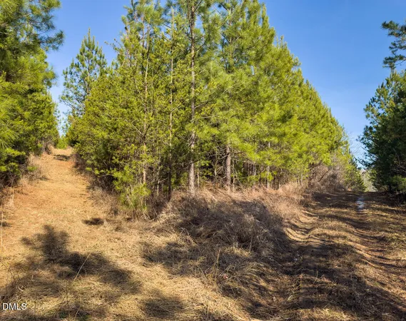 an outdoor view of a house with a yard