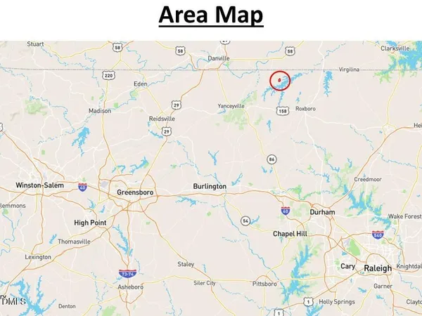 a view of a wooden floor with a white wall