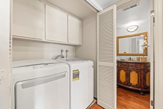 a utility room with dryer and washer