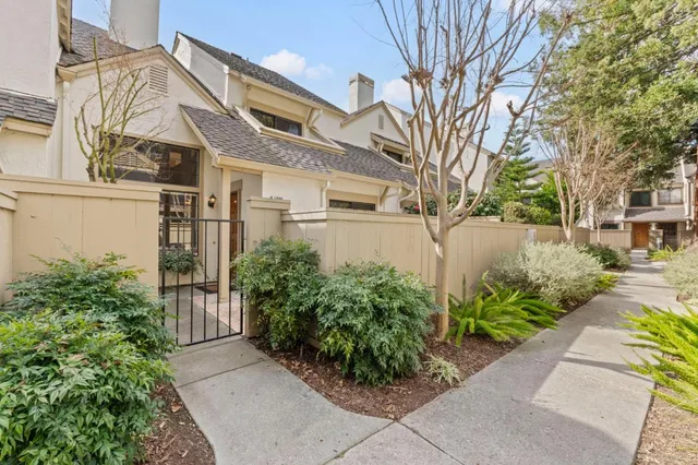 front view of a house with a garden