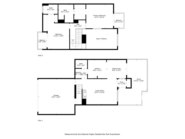 an aerial view of a house with outdoor space