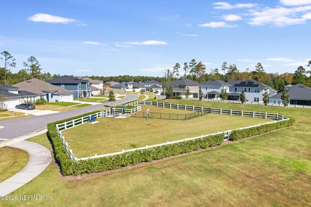 a view of a swimming pool with an ocean view