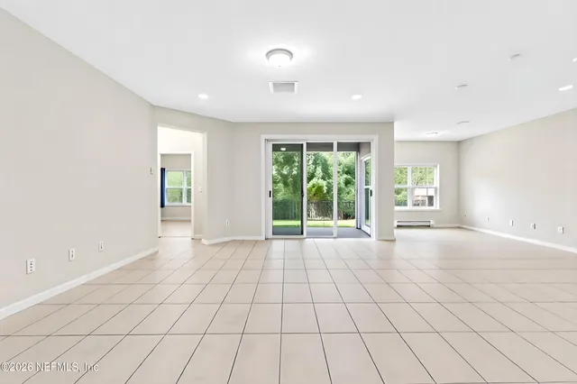 a view of an empty room and window