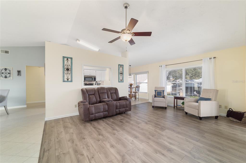 4385 North Bacall Loop Beverly Hills, FL 34465 - Photo 14 of 60 a living room with furniture and a large window