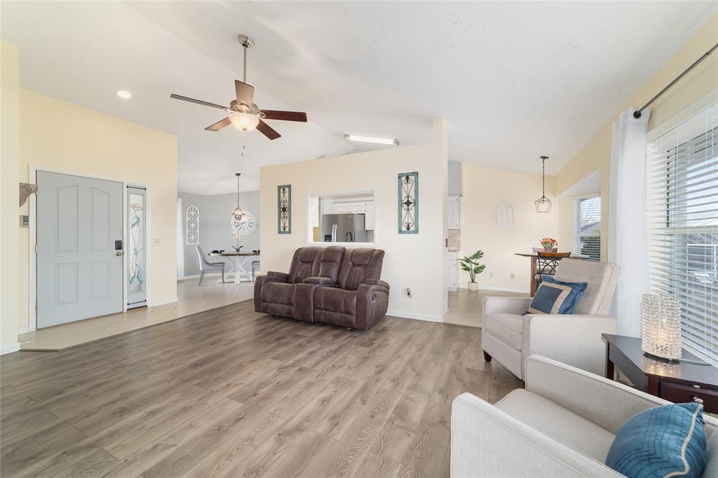 4385 North Bacall Loop Beverly Hills, FL 34465 - Photo 16 of 60 a living room with furniture and a wooden floor