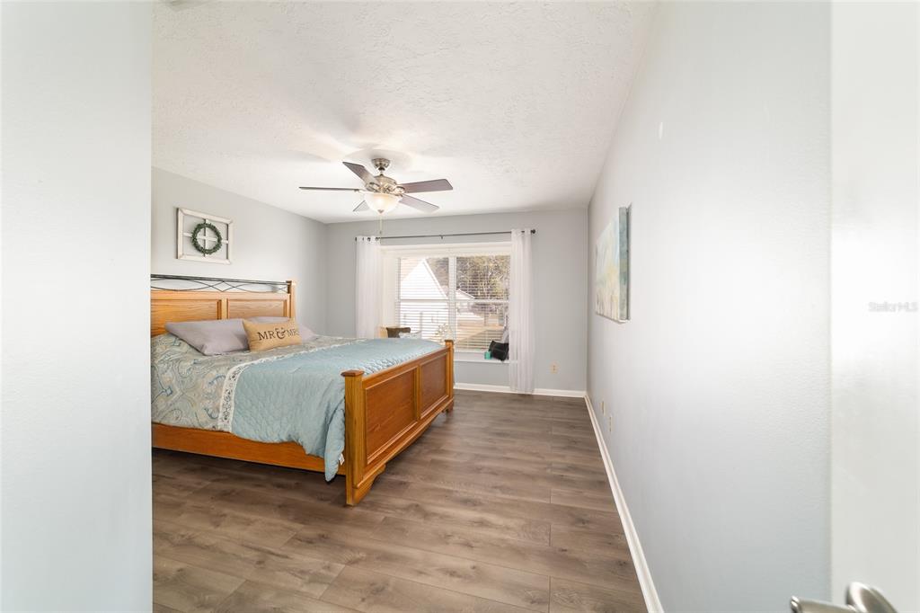 4385 North Bacall Loop Beverly Hills, FL 34465 - Photo 29 of 60 a bedroom with a bed and window