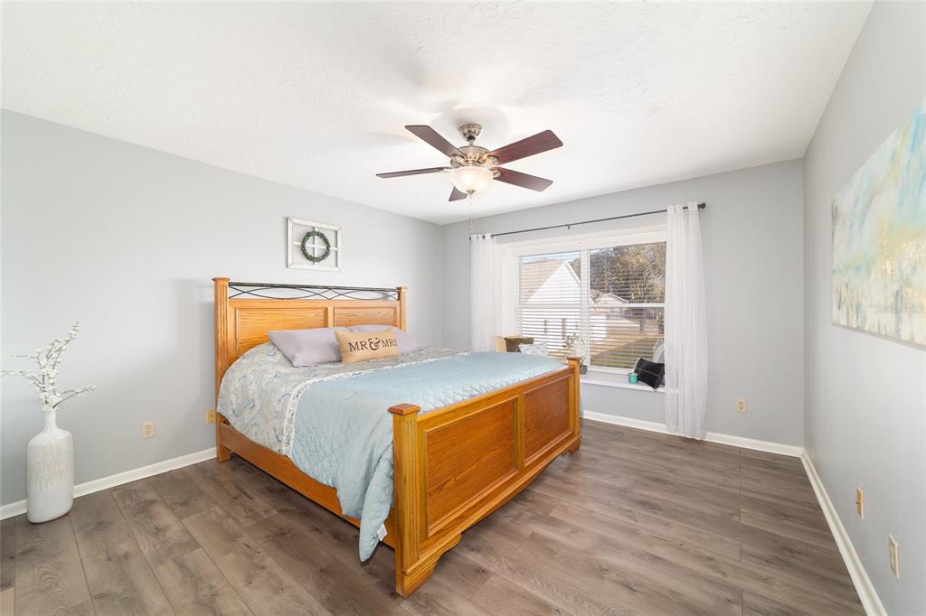 4385 North Bacall Loop Beverly Hills, FL 34465 - Photo 30 of 60 a bedroom with a bed and window