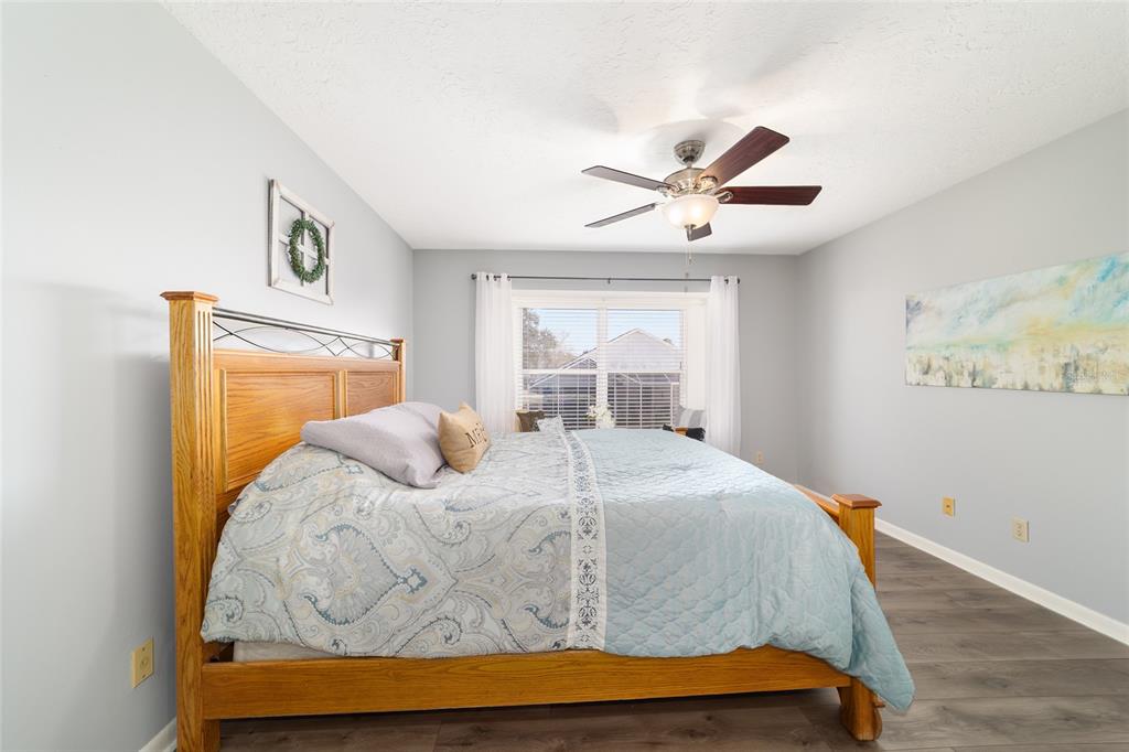 4385 North Bacall Loop Beverly Hills, FL 34465 - Photo 33 of 60 a bedroom with a bed and window